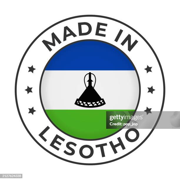 made in lesotho - vector graphics. round simple label badge emblem with flag of lesotho and text made in lesotho. isolated on white background - lesotho flag stock illustrations