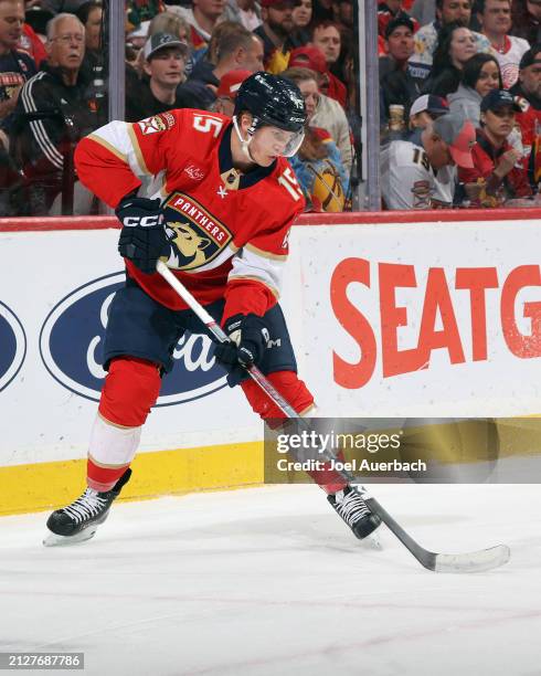 Anton Lundell of the Florida Panthers skates with the puck against the Detroit Red Wings at the Amerant Bank Arena on March 30, 2024 in Sunrise,...