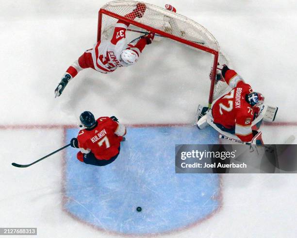 Compher of the Detroit Red Wings knocksf the Florida Panthers net off its moorings at the Amerant Bank Arena on March 30, 2024 in Sunrise, Florida.
