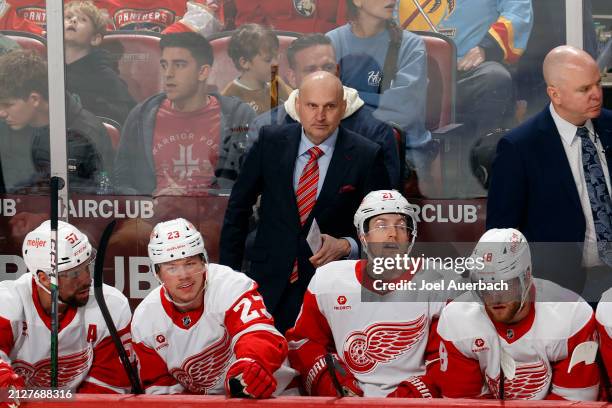 Head coach Derek Lalonde of the Detroit Red Wings looks on during third period action against the Florida Panthers at the Amerant Bank Arena on March...
