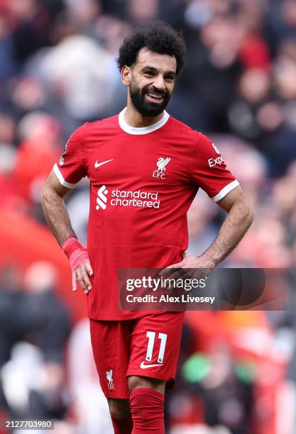 Mohamed Salah of Liverpool reacts at full time following the team's victory during the Premier League match between Liverpool FC and Brighton & Hove...