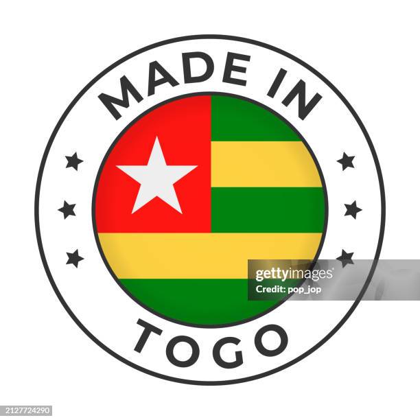 made in togo - vector graphics. round simple label badge emblem with flag of togo and text made in togo. isolated on white background - togo logo stock illustrations