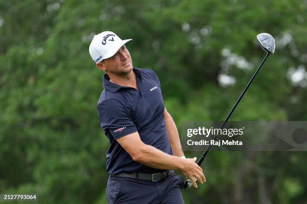 Alex Noren of Sweden watches his shot from the first tee during the final round of the Texas Children's Houston Open at Memorial Park Golf Course on...