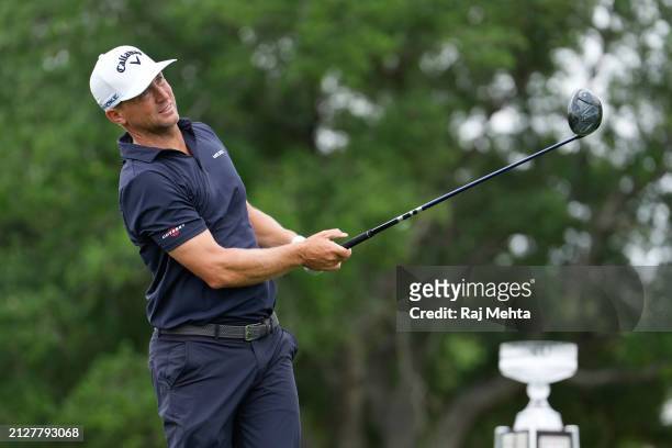 Alex Noren of Sweden watches his shot from the first tee during the final round of the Texas Children's Houston Open at Memorial Park Golf Course on...
