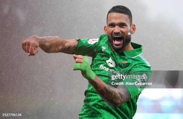 Willian Jose of Real Betis celebrates scoring his team's second goal during the LaLiga EA Sports match between Girona FC and Real Betis at Montilivi...
