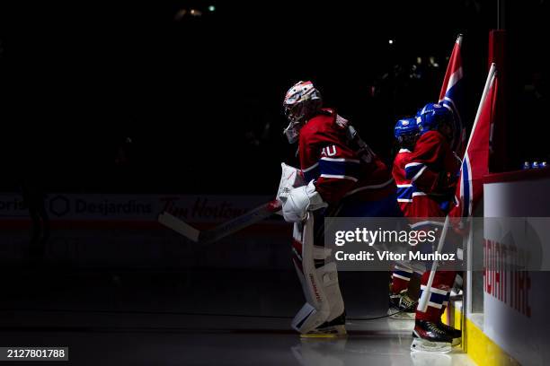 Cayden Primeau of the Montreal Canadiens steps onto the ice for the NHL regular season game against the Philadelphia Flyers at the Bell Centre on...