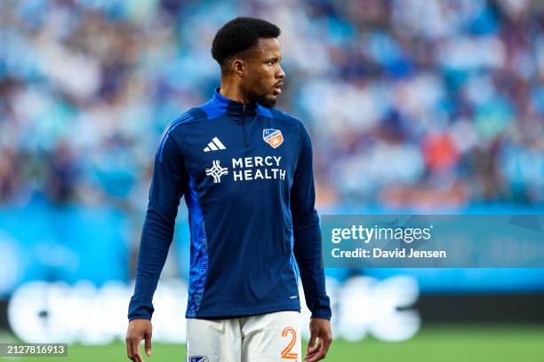 Alvas Powell of FC Cincinnati warms up before a soccer match against the Charlotte FC at Bank of America Stadium on March 30, 2024 in Charlotte,...