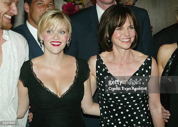 Reese Witherspoon and Sally Field pose for a cast photo at the "Legally Blonde 2: Red, White and Blonde" film premiere at The Ziegfeld Theater on...