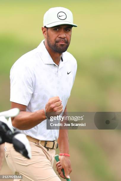 Tony Finau of the United States reacts to a chip in on the fourth green during the final round of the Texas Children's Houston Open at Memorial Park...