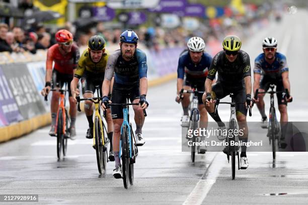Riley Sheehan of The United States and Team Israel - Premier Tech and Kamil Malecki of Poland and Q36.5 Pro Cycling Team cross the finish line during...