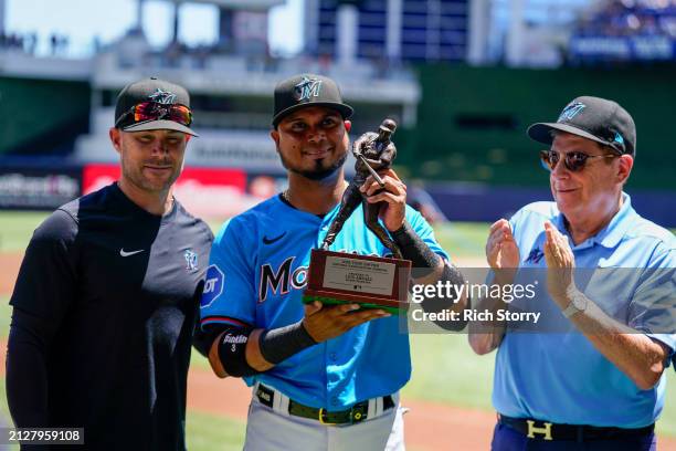 Skip Schumaker and Bruce Sherman present the Tony Gwynn award to Luis Arraez of the Miami Marlins prior to a game against the Pittsburgh Pirates at...