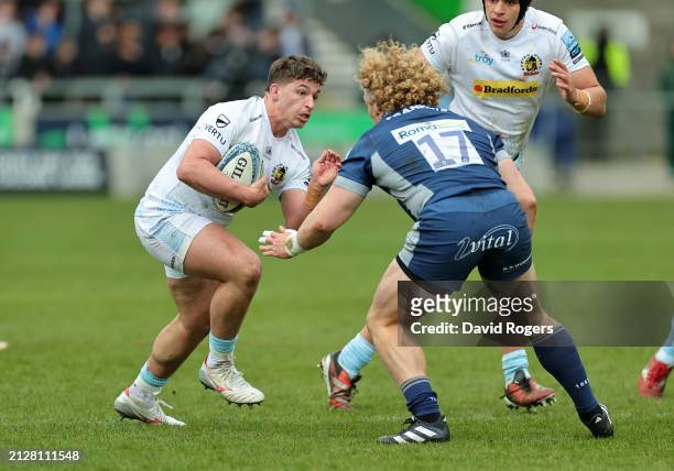 Dan Frost of Exeter Chiefs takes on Ross Harrison during the Gallagher Premiership Rugby match between Sale Sharks and Exeter Chiefs at the AJ Bell...