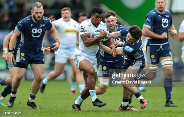 Immanuel Feyi-Waboso of Exeter Chiefs is tackled by Raffi Quirke during the Gallagher Premiership Rugby match between Sale Sharks and Exeter Chiefs...