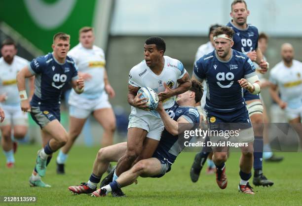 Immanuel Feyi-Waboso of Exeter Chiefs is tackled by Raffi Quirke during the Gallagher Premiership Rugby match between Sale Sharks and Exeter Chiefs...