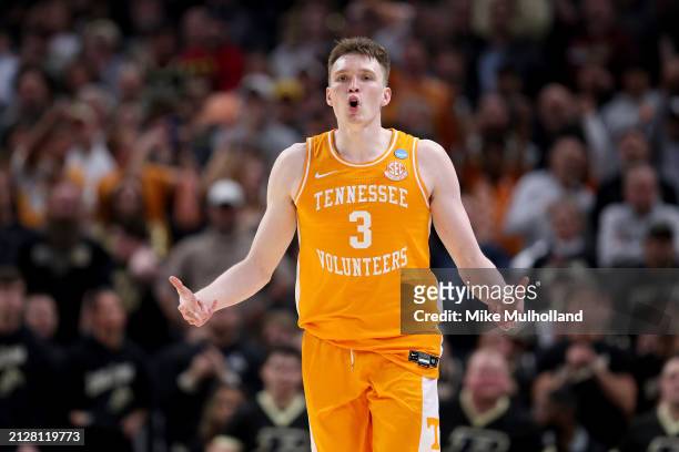 Dalton Knecht of the Tennessee Volunteers celebrates a three point basket against the Purdue Boilermakers during the first half in the Elite 8 round...