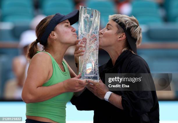 Sofia Kenin and Bethanie Mattek-Sands of the United States celebrate the win over Gabriela Dabrowski of Canada and Erin Routliffe of New Zealand by...