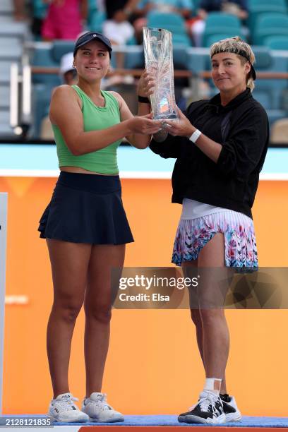 Sofia Kenin and Bethanie Mattek-Sands of the United States celebrate the win over Gabriela Dabrowski of Canada and Erin Routliffe of New Zealand...