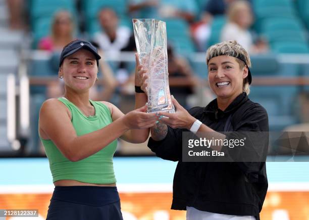 Sofia Kenin and Bethanie Mattek-Sands of the United States celebrate the win over Gabriela Dabrowski of Canada and Erin Routliffe of New Zealand...