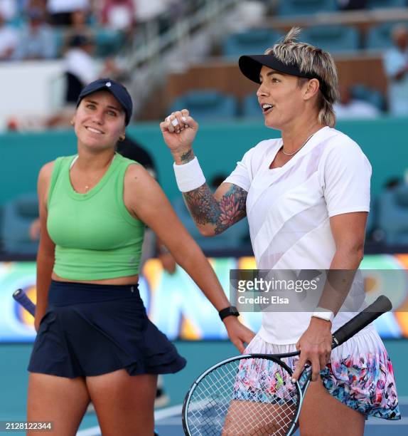 Sofia Kenin and Bethanie Mattek-Sands of the United States celebrate the match win over Gabriela Dabrowski of Canada and Erin Routliffe of New...