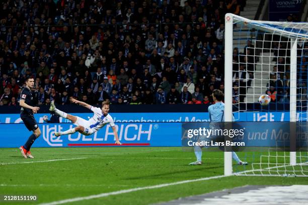 Oscar Vilhelmsson of SV Darmstadt 98 scores his team's second goal during the Bundesliga match between VfL Bochum 1848 and SV Darmstadt 98 at Vonovia...