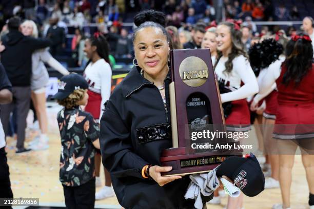 Head coach Dawn Staley of the South Carolina Gamecocks celebrates after beating the Oregon State Beavers in the Elite 8 round of the NCAA Women's...