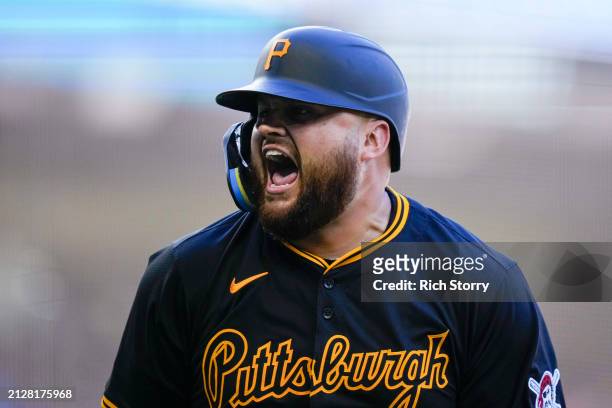 Rowdy Tellez of the Pittsburgh Pirates celebrates after hitting two run home run against the Miami Marlins during the seventh inning at loanDepot...