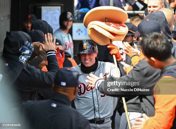 Kerry Carpenter of the Detroit Tigers is congratulated by teammates following a home run during the fourth inning of a game Chicago White Sox at...