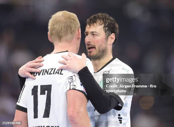 Partick Wiencek and Domagoj Duvnjak of THW gestures during the first Handball Bundesliga match between THW Kiel and SG Flensburg-Handewitt on March...