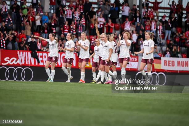 The team of FC Bayern München celebrates during the Women's DFB Cup semifinal match between FC Bayern München v Eintracht Frankfurt at FC Bayern...