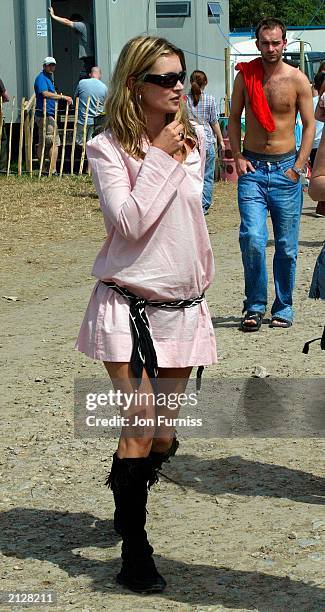 Model Kate Moss strolling around The Glastonbury Festival 2003 on June 27, 2003 at Pilton in Shepton Mallett, Glastonbury in England.