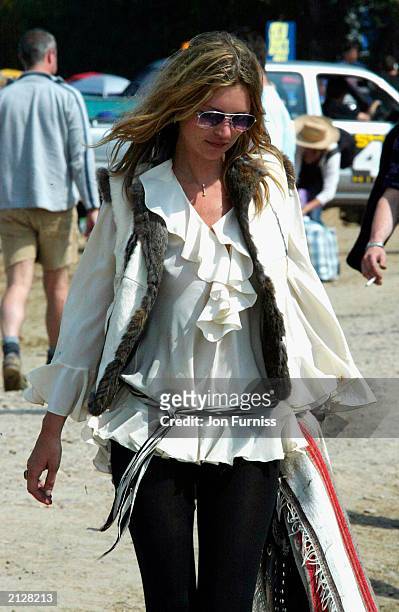 Model Kate Moss strolling around The Glastonbury Festival 2003 on June 27, 2003 at Pilton in Shepton Mallett, Glastonbury in England.
