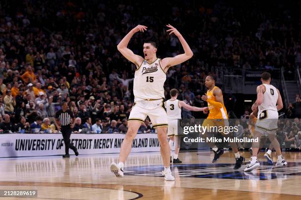 Zach Edey of the Purdue Boilermakers celebrates against the Tennessee Volunteers during the second half in the Elite 8 round of the NCAA Men's...