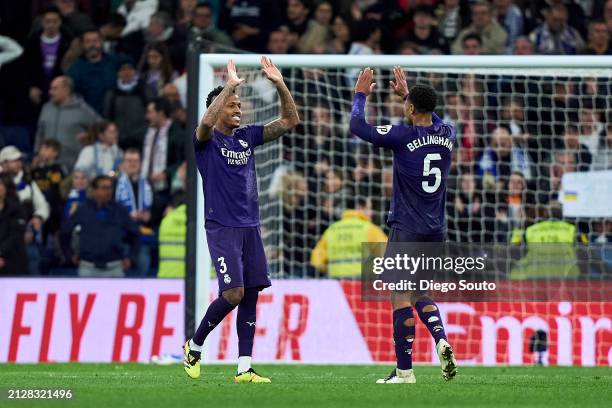 Eder Militao and Jude Bellingham of Real Madrid salutes af the LaLiga EA Sports match between Real Madrid CF and Athletic Bilbao at Estadio Santiago...