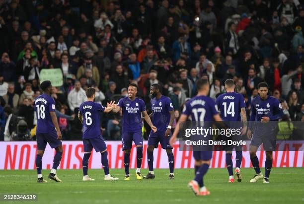 Eder Militao of Real Madrid reacts with Nacho Fernandez at the final whistleduring the LaLiga EA Sports match between Real Madrid CF and Athletic...