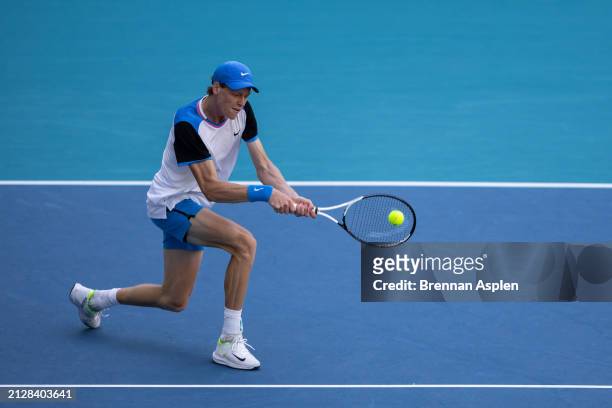 Jannik Sinner of Italy hits a shot against Grigor Dimitrov of Bulgaria in the men's final of the Miami Open at Hard Rock Stadium on March 31, 2024 in...