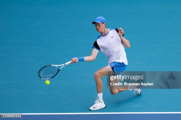 Jannik Sinner of Italy hits a shot against Grigor Dimitrov of Bulgaria in the men's final of the Miami Open at Hard Rock Stadium on March 31, 2024 in...