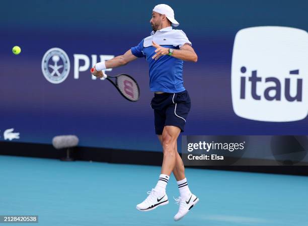 Grigor Dimitrov of Bulgaria returns a shot to Jannik Sinner of Italy during the Men's Final at Hard Rock Stadium on March 31, 2024 in Miami Gardens,...