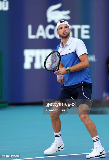 Grigor Dimitrov of Bulgaria reacts during the match against Jannik Sinner of Italy in the Men's Final at Hard Rock Stadium on March 31, 2024 in Miami...