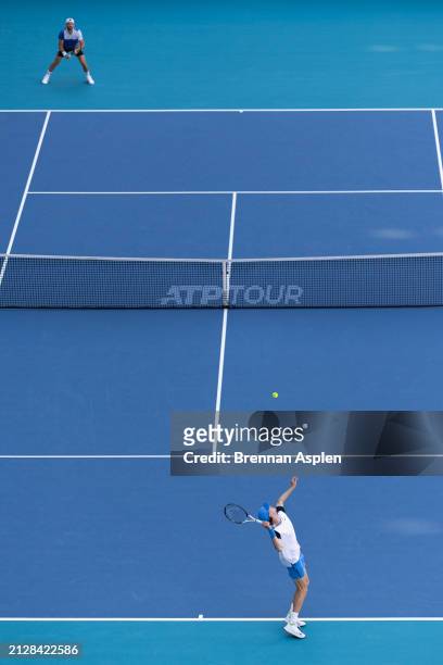 Jannik Sinner of Italy returns against Grigor Dimitrov of Bulgaria in the men's final of the Miami Open at Hard Rock Stadium on March 31, 2024 in...