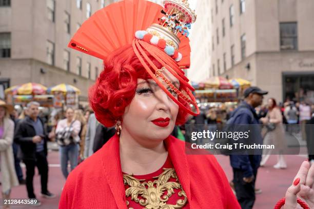 People wear colorful costumes and bonnets during the annual Easter Bonnet Parade outside Saint Patrick's Cathedral and Fifth avenue in New York City...