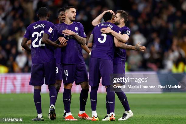 Nacho Fernandez, Eder Milatao, Joselu Mato, Aurelien Tchouameni, and Antonio Rudiger of Real Madrid celebrate during the LaLiga EA Sports match...