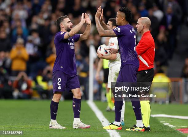 Daniel Carvajal of Real Madrid is replaced by Eder Militao during the LaLiga EA Sports match between Real Madrid CF and Athletic Bilbao at Estadio...