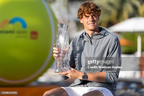 Jannik Sinner of Italy poses with the Miami Open men's trophy at Hard Rock Stadium on March 31, 2024 in Miami Gardens, Florida.