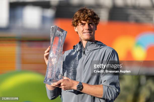 Jannik Sinner of Italy poses with the Miami Open men's trophy at Hard Rock Stadium on March 31, 2024 in Miami Gardens, Florida.