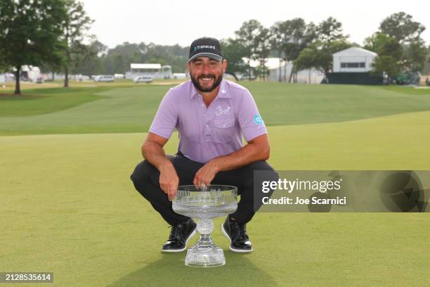 Stephan Jaeger of Germany poses for a photo with the trophy after winning the Texas Children's Houston Open at Memorial Park Golf Course on March 31,...