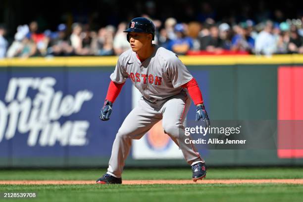 Masataka Yoshida of the Boston Red Sox takes a lead off of second base during the sixth inning against the Seattle Mariners at T-Mobile Park on March...