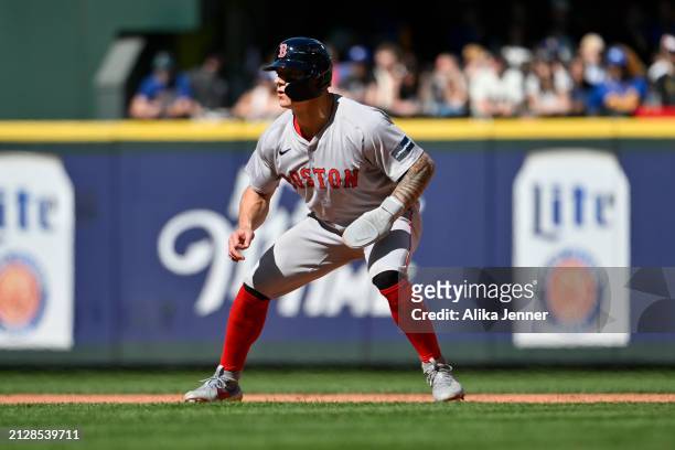 Tyler O'Neill of the Boston Red Sox takes a lead off of second base during the sixth inning against the Seattle Mariners at T-Mobile Park on March...