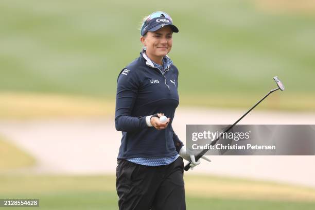 Lexi Thompson of the United States reacts on the 18th green during the final round of the Ford Championship presented by KCC at Seville Golf and...