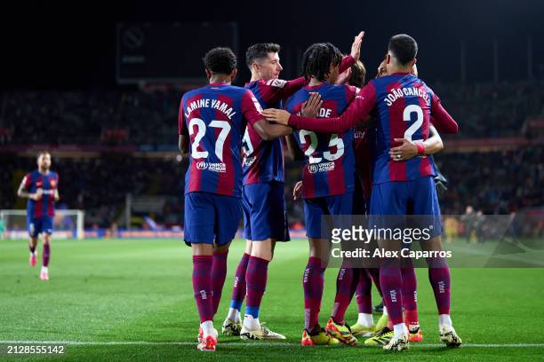 Raphinha of FC Barcelona celebrates with his teammates after scoring their team's first goal during the LaLiga EA Sports match between FC Barcelona...