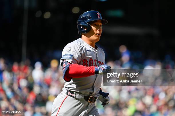 Masataka Yoshida of the Boston Red Sox in action during the fourth inning against the Seattle Mariners at T-Mobile Park on March 31, 2024 in Seattle,...